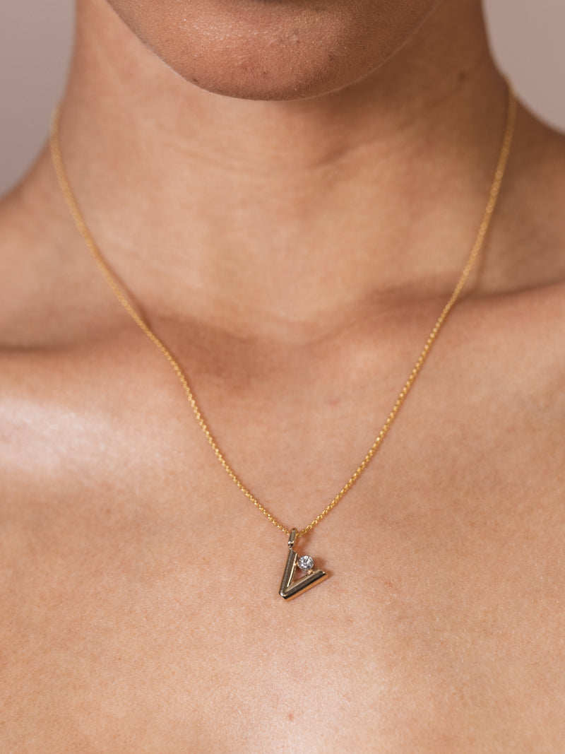 Shop Louis Vuitton Lv volt one small pendant, white gold and